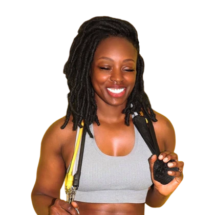 Linda Orji smiling in workout attire with locs for her Manifesting & Fitness program